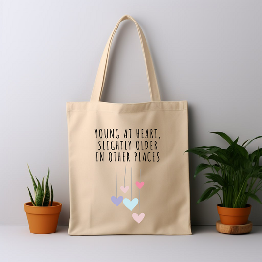 Cotton Tote Bag: Young At Heart, Slightly Older In Other Places